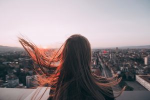 Soft red hair colour, woman with long soft red hair 