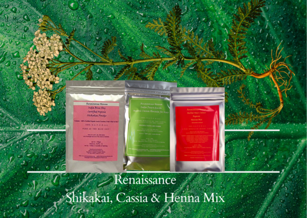 Strawberry blonde powders in 3 foil sealed packets - shikakai with pink label on left, cassia obovata with green label in the middle, and henna mix packet with red label on the right, all displayed against a green leaf and plant background