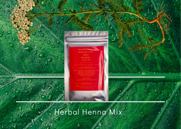 Natural auburn hair dye, product image foil sealed packet with red label against a green leaf and plant background