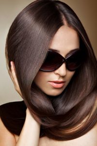 Argan Hair Oil. Portrait of beautiful young woman with healthy long hair