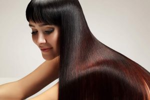 Natural Hair Dyes for healthy hair, image of woman with beautiful, glossy, healthy hair