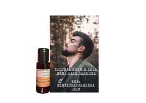 photo depicting mens natural hair care oil : young man with well groomed dark brown hair and beard with face tilted towards the sunlight, eyes closed, standing against a natural forest background, wearing grey sweater. Neem for nits hair oil.