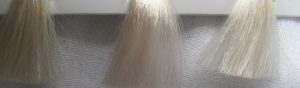 Bleached blonde hair strands