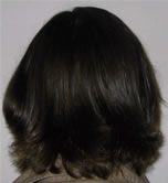 David's back view showing dark brown-black hair after henna and indigo